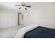 Bedroom features a closet and an open doorway at 1127 Woodlands Creek Way, Apex, NC 27502