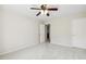 Bedroom features neutral carpeting and ceiling fan at 1127 Woodlands Creek Way, Apex, NC 27502
