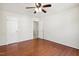 Spacious bedroom includes ceiling fan and closet at 1127 Woodlands Creek Way, Apex, NC 27502