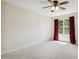 Large bedroom features plush carpeting, and natural light at 1127 Woodlands Creek Way, Apex, NC 27502