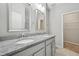 Modern bathroom features a double granite vanity and tiled floors at 1217 Neighborly Way, Morrisville, NC 27560