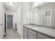 Modern bathroom with granite vanity, stylish fixtures and tile floors at 1217 Neighborly Way, Morrisville, NC 27560