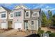 Charming two-story home with a well-maintained yard and attached garage at 1217 Neighborly Way, Morrisville, NC 27560
