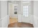 Bright foyer with hardwood floors and access to laundry room at 1217 Neighborly Way, Morrisville, NC 27560