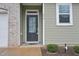 Welcoming entrance of home showcasing the front door and house number at 1217 Neighborly Way, Morrisville, NC 27560