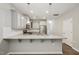 Modern kitchen with granite countertops, stainless steel appliances, and center island at 1217 Neighborly Way, Morrisville, NC 27560