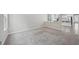 Spacious living room with neutral carpet and views to the kitchen, ideal for modern living at 1217 Neighborly Way, Morrisville, NC 27560
