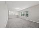Upstairs loft area filled with natural light from multiple windows, great for a home office or play area at 1217 Neighborly Way, Morrisville, NC 27560