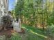 Relaxing backyard with a deck and lush green lawn at 1322 Pebble Creek Xing, Durham, NC 27713