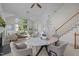 Cozy living room with ample natural light, comfortable seating, and stylish decor creates a relaxing space at 1322 Pebble Creek Xing, Durham, NC 27713