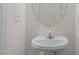 Powder room with sleek faucet and white sink at 1322 Pebble Creek Xing, Durham, NC 27713