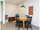Cozy dining area featuring a wooden table, perfect for intimate meals and gatherings at 140 Clear Water Rd, Louisburg, NC 27549