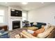 Inviting living room features a fireplace and comfortable seating arrangements perfect for relaxation and entertaining at 140 Clear Water Rd, Louisburg, NC 27549