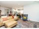 Open-concept living room showcases seamless flow to the kitchen, ideal for modern living and entertaining at 140 Clear Water Rd, Louisburg, NC 27549