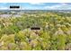 Picturesque aerial view of 1433 Andersonwood Dr, Fuquay-Varina, 2.8 miles away, immersed in a verdant treetop setting at 1433 Andersonwood Dr, Fuquay Varina, NC 27526