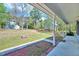 Expansive backyard featuring a well-maintained lawn, fire pit, and view of the home at 1433 Andersonwood Dr, Fuquay Varina, NC 27526