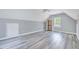 Spacious bedroom features vinyl flooring, natural lighting, and a built-in shelf at 1433 Andersonwood Dr, Fuquay Varina, NC 27526