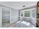 Inviting dining area featuring a contemporary light fixture and a large bay window at 1433 Andersonwood Dr, Fuquay Varina, NC 27526