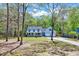 Traditional two-story home with light-blue siding, dormer windows and a well-kept lawn at 1433 Andersonwood Dr, Fuquay Varina, NC 27526