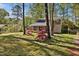 Charming home with lush landscaping and mature trees in a desirable location at 1517 Laughridge Dr, Cary, NC 27511