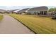 A view of the manicured backyards and walking path in the neighborhood at 158 Sea Foam Dr, Raleigh, NC 27610