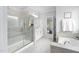 Elegant bathroom featuring a glass enclosed shower, soaking tub, and & vanity at 158 Sea Foam Dr, Raleigh, NC 27610