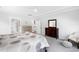 Bright bedroom featuring a ceiling fan, soft carpet, and complementing furniture set at 158 Sea Foam Dr, Raleigh, NC 27610