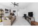 Well-lit bonus room with a ceiling fan and comfortable seating at 158 Sea Foam Dr, Raleigh, NC 27610
