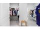 Spacious walk-in closet featuring hanging racks and shelving at 158 Sea Foam Dr, Raleigh, NC 27610