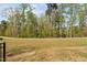 View of a well-manicured lawn and landscape in a quiet neighborhood at 158 Sea Foam Dr, Raleigh, NC 27610