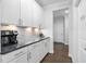 Convenient butler's pantry with ample counter and cabinet space at 158 Sea Foam Dr, Raleigh, NC 27610
