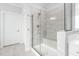 Beautiful new shower with gray tile and a built-in bench at 158 Sea Foam Dr, Raleigh, NC 27610