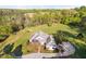 Stunning aerial view of a well-maintained property with lush landscaping, offering a serene and private setting at 1601 Dairyland Rd, Chapel Hill, NC 27516