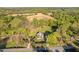 Stunning aerial view of the property, showcasing the house, landscape, and surrounding area at 1601 Dairyland Rd, Chapel Hill, NC 27516