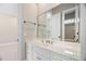 Bathroom featuring a white vanity with modern fixtures, and a large mirror reflecting the spacious layout at 1601 Dairyland Rd, Chapel Hill, NC 27516