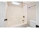 Bright bathroom featuring a tub and shower combination with neutral walls at 1601 Dairyland Rd, Chapel Hill, NC 27516