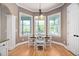 Charming breakfast nook with large windows providing natural light and views of the outdoors at 1601 Dairyland Rd, Chapel Hill, NC 27516