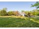 Charming single-Gathering home with a well-maintained lawn, mature trees and shrubbery at 1601 Dairyland Rd, Chapel Hill, NC 27516