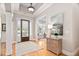 Elegant foyer with hardwood floors, decorative console table, and a seamless transition to other living spaces at 1601 Dairyland Rd, Chapel Hill, NC 27516