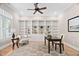Bright home office with custom built-ins, ample natural light, and a comfortable workspace for productivity at 1601 Dairyland Rd, Chapel Hill, NC 27516
