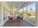 Spacious screened porch featuring stylish outdoor seating and lush greenery at 1601 Dairyland Rd, Chapel Hill, NC 27516