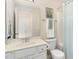 Bright bathroom featuring a shower/tub combination, toilet, and sink at 162 Grey Elm Trl, Durham, NC 27713