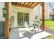 Cozy patio with table and chairs, offering a relaxing outdoor living space at 162 Grey Elm Trl, Durham, NC 27713