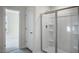 This bathroom features a shower with glass doors and access to a separate closet at 189 Calebs Corner Pl, Spring Lake, NC 28390
