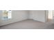 This bedroom has neutral carpet and a window for natural light at 189 Calebs Corner Pl, Spring Lake, NC 28390