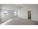 Spacious main bedroom with vaulted ceilings, carpeting, and large windows for natural light at 189 Calebs Corner Pl, Spring Lake, NC 28390