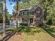 A charming two-story home with a manicured lawn, a two-car garage and a welcoming front porch at 2 Piney Ridge Ct, Durham, NC 27712
