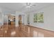 Spacious living room with hardwood floors and view to the kitchen at 2 Piney Ridge Ct, Durham, NC 27712