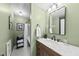 Elegant bathroom with marble countertops, modern fixtures, and tiled floors for a spa-like experience at 205 W Moore St, Apex, NC 27502