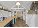 Interior of shed with bar area, shelves, and chair at 205 W Moore St, Apex, NC 27502